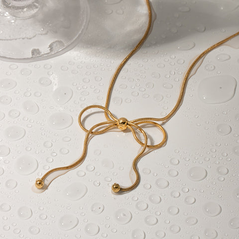 BOW DANGY NECKLACE